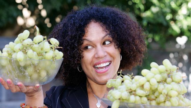 Singer Christine Anu enjoying some grapes.