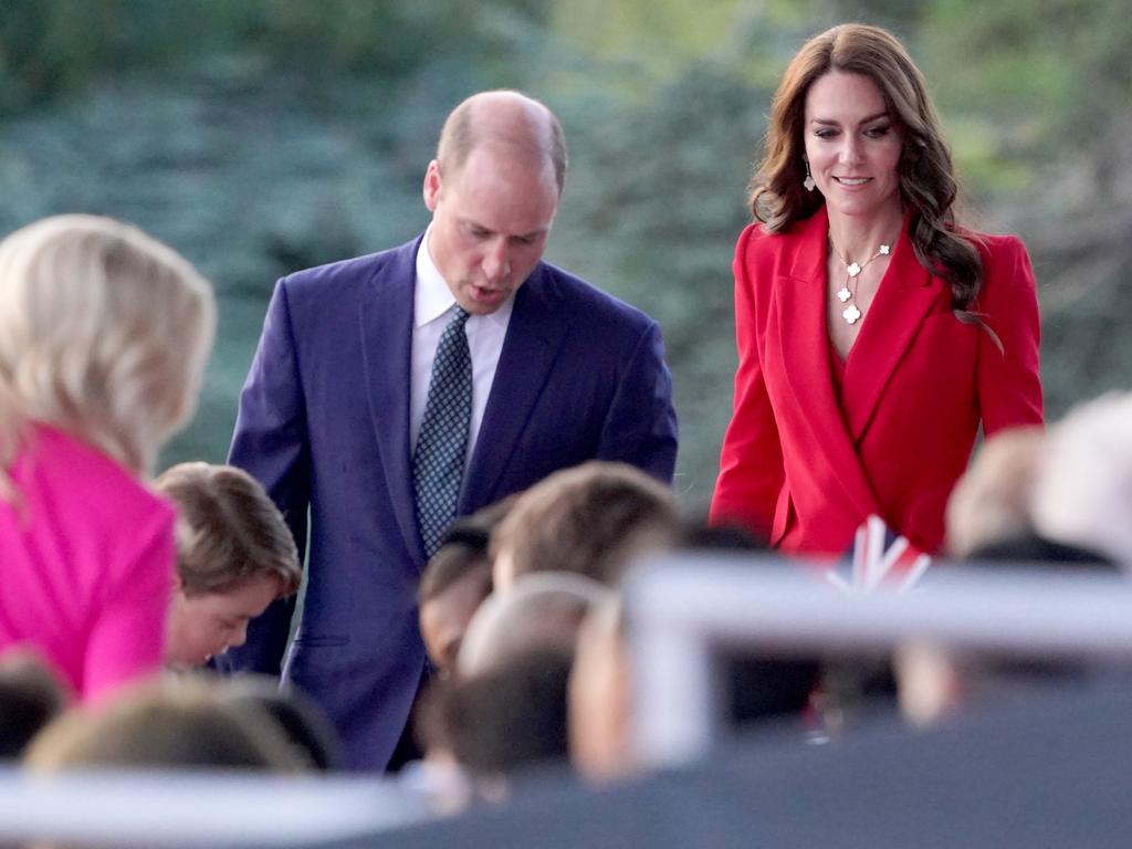 Prince William and Catherine take their seats in the royal box at Windsor Castle. Picture: PA