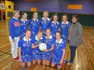 CLASSY TEAM: The Warwick 14 years netball team (back, from left) coach Deanna Naughten, Alexandra Rickert, Zara MacPherson, Abigail Skaines, Georgia Denny, Heidi Burton, manager Tammy Mullaly, (front) Bridget Hardy, Jessica Mullaly, Dakota Newton and Lily Nolan. Picture: Gerard Walsh