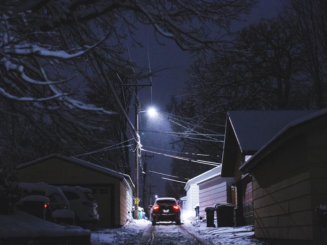 Snow falls in the alley in the Fulton neighbourhood of Minneapolis where Justine Ruszczyk approached a Minneapolis Police Department squad car after reporting a possible sexual assault. Picture: Angus Mordant for News Corp Australia