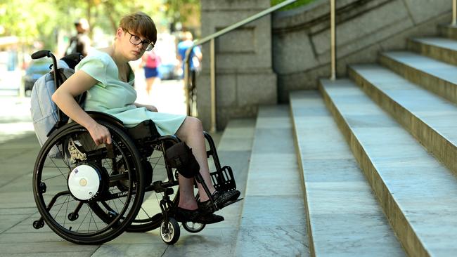 Dignity for Disability MLC Kelly Vincent in her wheelchair at the steps to Parliament House. Picture: Mark Brake