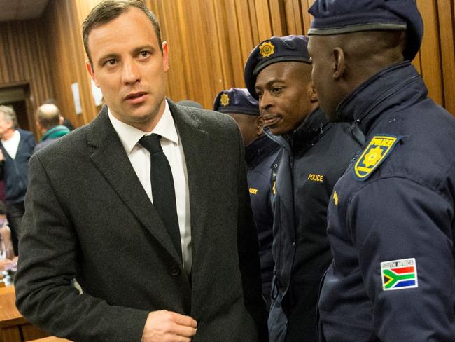 Paralympian athlete Oscar Pistorius, accused of the murder of his girlfriend Reeva Steenkamp three years ago, arrives at the High Court in Pretoria, on July 6, 2016 for a hearing in his murder trail. Paralympian Oscar Pistorius will learn on July 6 how long he will spend in jail when a judge sentences him for murdering his girlfriend Reeva Steenkamp three years ago. Pistorius was freed from prison in the South African capital Pretoria last October after serving one year of a five-year term for culpable homicide -- the equivalent of manslaughter. / AFP PHOTO / POOL / MARCO LONGARI