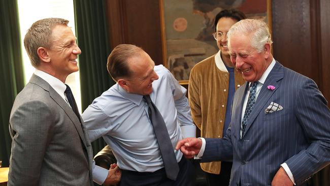 Prince Charles speaks to actors Daniel Craig, Ralph Fiennes and director Cary Joji Fukunaga during a visit to the James Bond set at Pinewood Studios in 2019 Picture: Getty Images