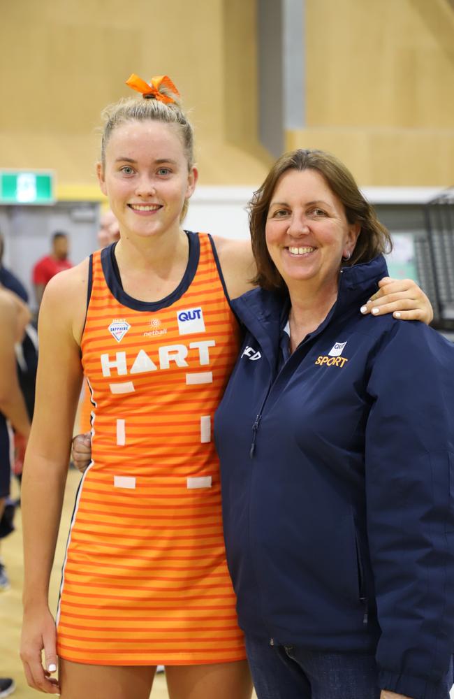 QUT netball rising star Reilley Batcheldor (left) and coach Paula Stuart