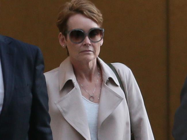 JM Kelly financial controller Elizabeth Murphy giving evidence in federal court into collapse of the building firm. Leaves court with lawyers.Tuesday 27th August 2019. (AAP Image - Richard Waugh)