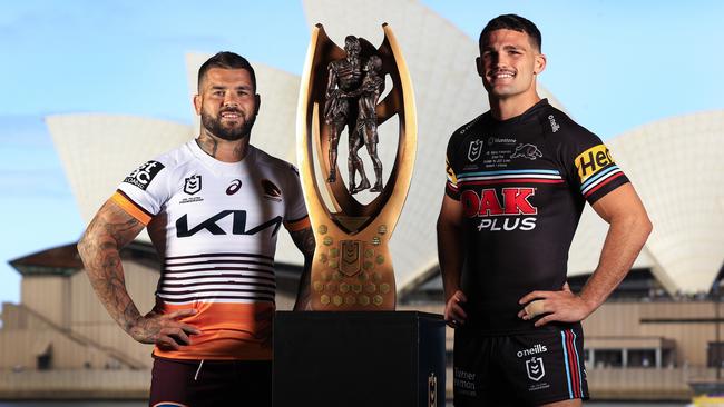 Captains Adam Reynolds and Nathan Cleary with the NRL premiership trophy. Picture: Adam Head