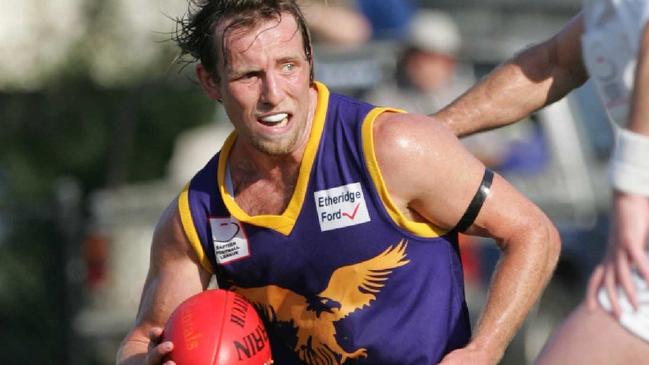 Vermont’s Bernie Dinneen just knocked-up getting the footy.