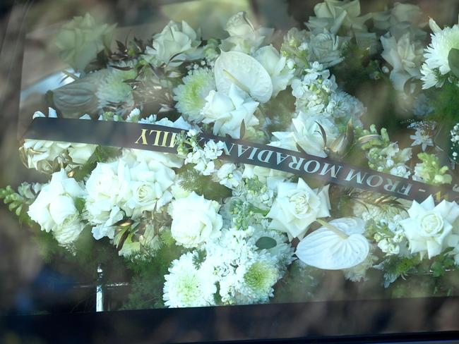 Flowers on top of Alen Moradian’s casket.