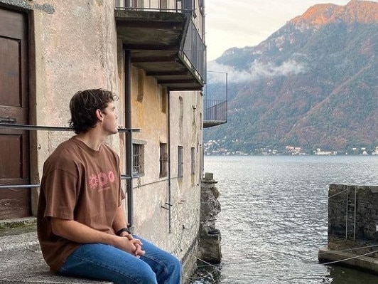 Brisbane player Deven Robertson on holidays at Lake Como, Italy, where a number of AFL players have travelled in recent weeks.