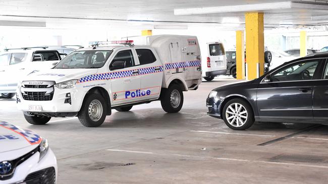 Police establish a crime scene in the car park under Super Cheap Auto after a man was stabbed in Nambour. Picture: Patrick Woods.