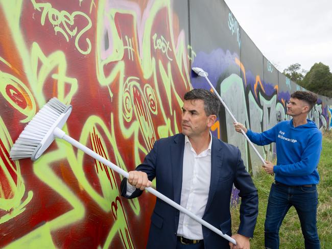 Victorian Liberal party leader Brad Battin and Nick McGowan MP is proposing that the dept of transport would be forced to clean up graffiti on freeways within 24 hours under a new approach to keeping roads clean. Pictured on Eastlink where graffiti spreads all along the road.  Picture: Jason Edwards