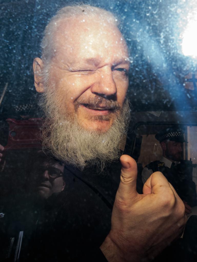 Julian Assange in 2019 when he was transported police to Westminster Magistrates court. Picture: Getty Images