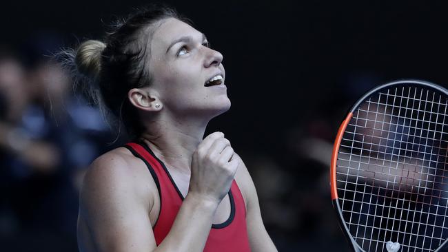 Simona Halep reacts after winning her women's semi-final against Angelique Kerber. Picture: AAP