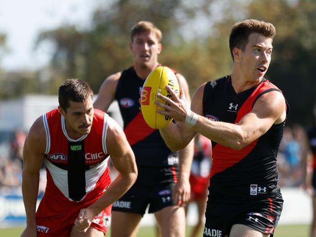 MELBOURNE, AUSTRALIA - MARCH 03: Zach Merrett of the Bombers in action during the 2023 AFL practice match between the St Kilda Saints and the Essendon Bombers at RSEA Park on March 3, 2023 in Melbourne, Australia. (Photo by Michael Willson/AFL Photos via Getty Images)