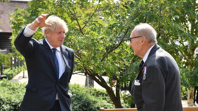 A mask-less Boris Johnson meets veterans in Alrewas, Staffordshire. Picture: Getty Images.