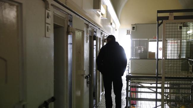 A Correctional Officer checking on a cell at Goulburn Correctional Centre today. Picture: Tim Hunter.