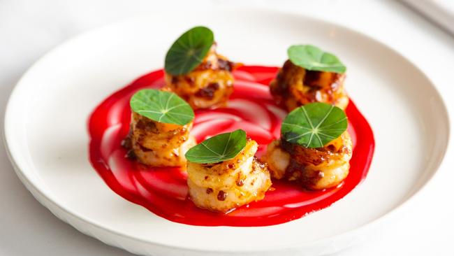 Coya's most popular dish, king prawns, with chilli jam and raspberry vinaigrette. Picture: Paulo Vasquez.