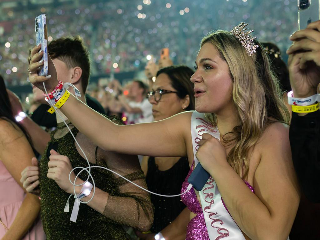 A fan wearing a Miss Americana sash has the time of her life in Atlanta, Georgia. Picture: Terence Rushin/TAS23/Getty Images