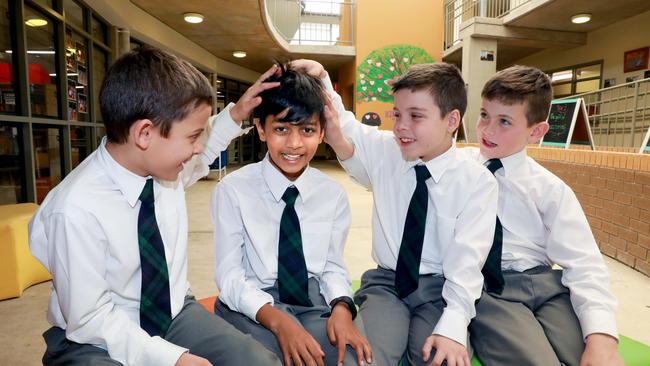 Xavier D'Silva battled Leukaemia in 2014 and has recently gone into remission. At eight years old the young introvert wants to give back to the doctors who helped save him by raising funds with a greatest shave. (AAP IMAGE / Angelo Velardo)