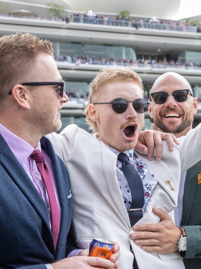 Some punters celebrate a win at the 2022 Melbourne Cup. Picture: Jason Edwards