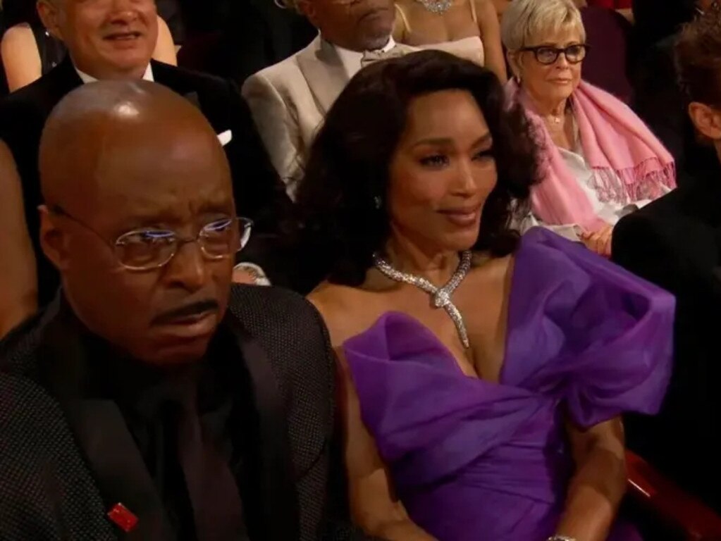 The star looked pained alongside husband Courtney B. Vance.