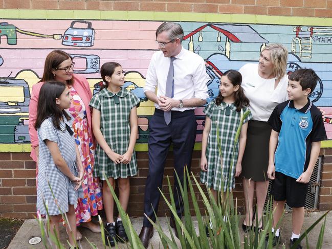 SYDNEY, AUSTRALIA - NewsWire photos JANUARY 30, 2023: NSW Premier Dominic Perrottet and Leppington Public School students Francesca 11yrs, Charlie, 11yrs, Summayyah, 11 yrs, and Selda, 11yrs during an announcement ahead of students returning to school this week in Sydney. Picture: NCA NewsWire / Dylan Coker