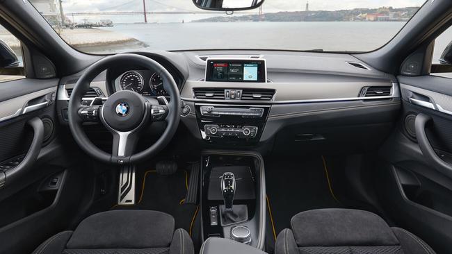 X2 cockpit: Ample space and shapely seats for driver and front passenger.