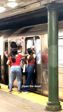 Bystanders help to free woman’s leg trapped in train door