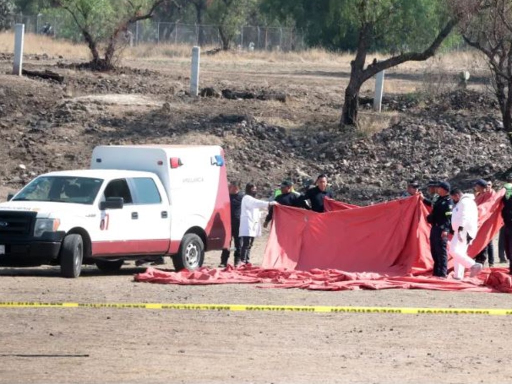 Mexican authorities investigating the wreckage. Picture: Alex Cruz/EPA-EFE/Shutterstock