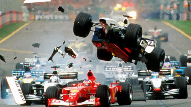 2002: In what is widely regarded as one of the most spectacular crashes in Formula One history, Ralf Schumacher takes the aerial route after colliding with Rubens Barrichello during the first lap of the Australian Grand Prix at Albert Park. Picture: AP Photo/Joe Mann