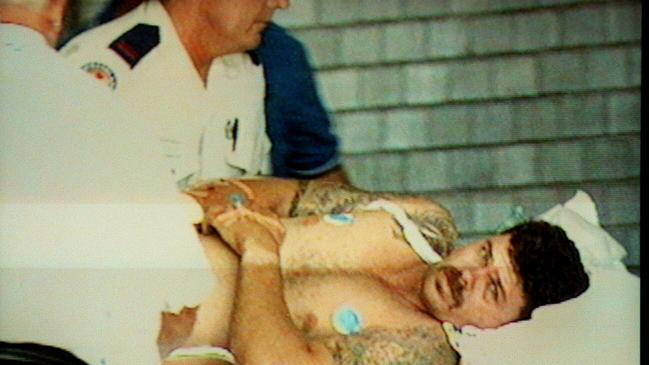 One of the victims is placed in an ambulance in November 1996. Picture: Courtesy Channel Nine.