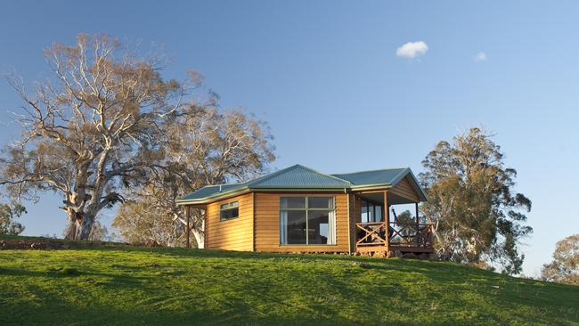 One of Curringa Farm’s cottages, set among the gum trees, is the perfect spot to take in the property’s peaceful views.