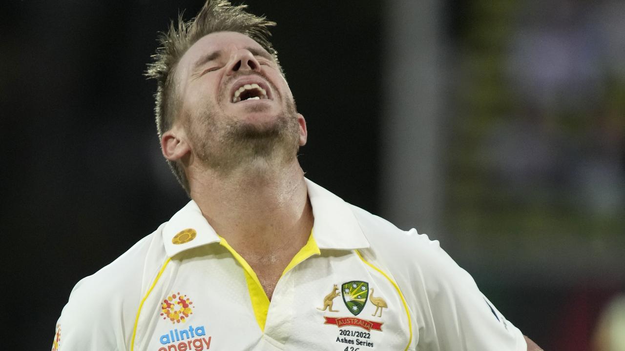 ADELAIDE, AUSTRALIA - DECEMBER 16: David Warner of Australia reacts after being dismissed by Ben Stokes of England for 95 runs during day one of the Second Test match in the Ashes series between Australia and England at the Adelaide Oval on December 16, 2021 in Adelaide, Australia. (Photo by Daniel Kalisz/Getty Images)