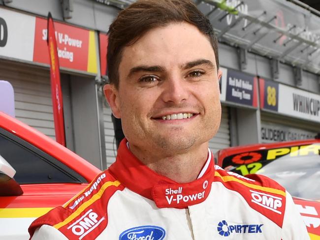 Tim Slade is a co-driver for DJR Team Penske poses for a photograph at the Superloop, Adelaide on Wednesday the 19th of February 2020.  SA Supercar driver Tim Slade who missed out on a full-time drive this year in Supercars, but got the next best thing, as the reigning champion's co-driver in the enduros later this year.  (AAP/ Keryn Stevens)