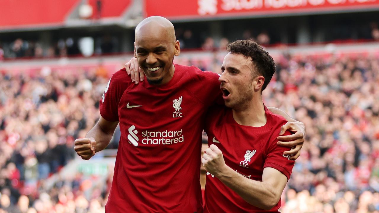 LIVERPOOL, ENGLAND – APRIL 22: Diogo Jota of Liverpool celebrates with teammate Fabinho after scoring the team's first goal during the Premier League match between Liverpool FC and Nottingham Forest at Anfield on April 22, 2023 in Liverpool, England. (Photo by Clive Brunskill/Getty Images)