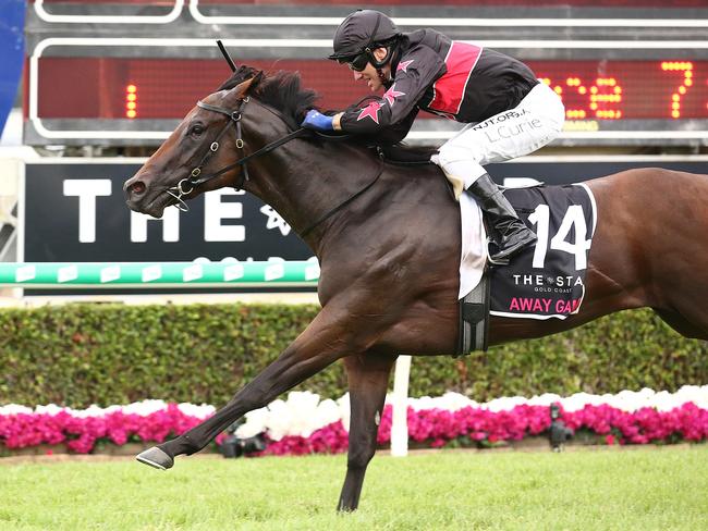 Jockey Luke Currie rides Away Game to victory in race 7, the Magic Millions 2YO Classic, during Magic Millions Race Day at Aquis Park on the Gold Coast,Saturday, January 11, 2020. (AAP Image/Jono Searle)