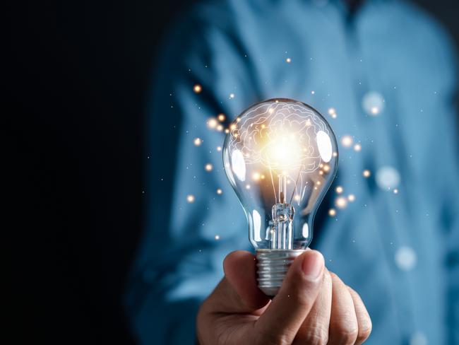 EMBARGO FOR TWAM, 01 FEBRUARY 2025. FEE MAY APPLY. Innovation through ideas and inspiration ideas. Human hand holding light bulb to illuminate, idea of creativity and inspiration concept of sustainable business development.