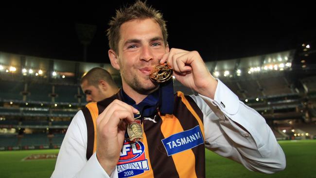 Hawthorn great Luke Hodge in 2008 with his Norm Smith and premiership medals.