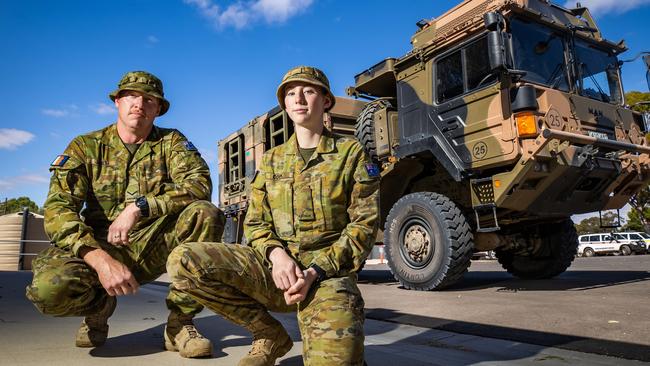 Australia Defence Force personnel Lance Corporal James and Private Cook with one of the high clearance vehicles deployed for the Murray River floods, at the Loxton SES headquarters. Picture: Tom Huntley