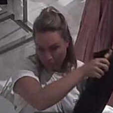 Police are seeking to speak to this woman, who they believe may be able to assist them with their investigation into the alleged theft of clothing items from a Broadbeach store in March.