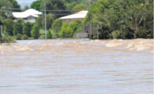 Normanby Bridge floodwater slowly recedes yesterday in Gympie. Picture: Renee Pilcher