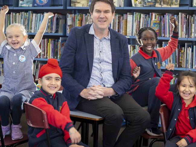 Daniel Riley, principal Dandenong Primary School, who will feature in the Herald Sun's Australia's Best Teachers campaign for his work empowering disadvantaged communities through education. Pictured with students Harper 7, Fatehbir 6, Aliza 7 and Phalika 8.Picture by Wayne Taylor 30th April 2025
