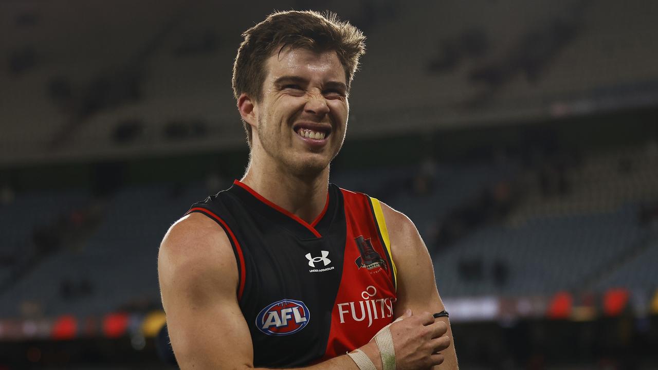 MELBOURNE, AUSTRALIA - AUGUST 14: Zach Merrett of the Bombers looks dejected after the round 22 AFL match between the Essendon Bombers and the Port Adelaide Power at Marvel Stadium on August 14, 2022 in Melbourne, Australia. (Photo by Daniel Pockett/Getty Images)