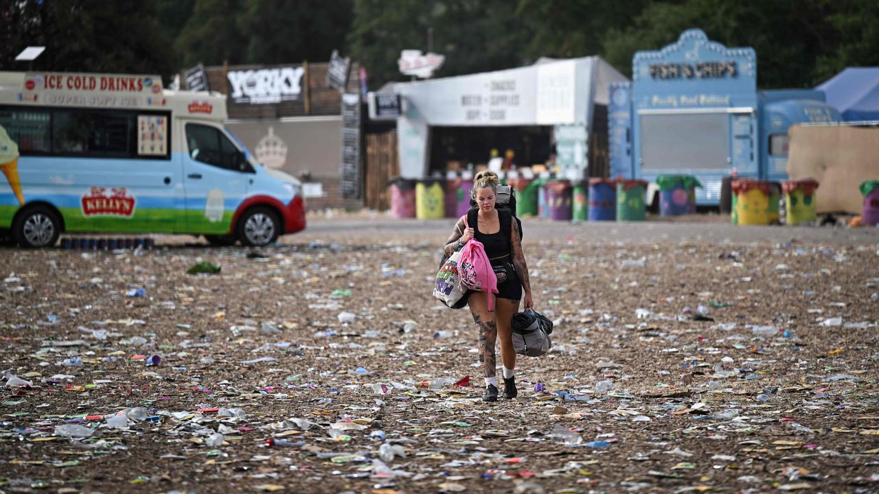 On average, about 9.5kg of waste is estimated to be left behind for each person who attends. Picture: Oli Scarff / AFP