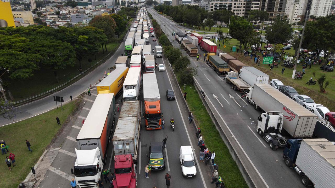 Aerial view showing supporters of President Jair Bolsonaro, mainly truck drivers, blocking Castelo Branco Highway. Picture: Caio Guatelli/AFP