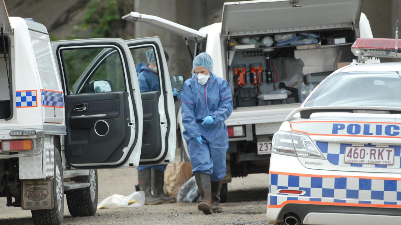 Scenes of Crime officers under the Ron Camm Bridge investigating the murder of Natasha McCarthy. Photo Lee Constable / Daily Mercury