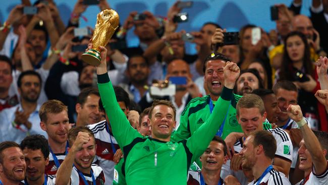 Manuel Neuer of Germany lifts the World Cup trophy.
