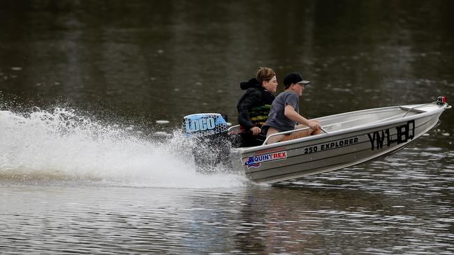 The head of the Gold Coast water police fears teenage tinnie rats driving recklessly will end up dead — he is leading a joint safety operation involving Pol. Air chopper support and Rapid Action Patrol officers during the next two weeks of school holidays. Photo: Jerad Williams