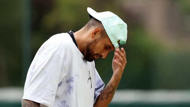 Nick Kyrgios on the Wimbledon practice courts after being summonsed to a Canberra court. Picture: Clive Brunskill/Getty