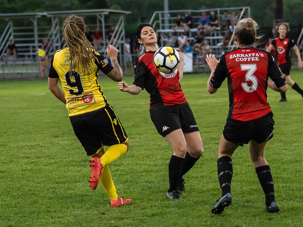 Leichhardt's Helen Cross defends in Saturday nights Women's FNQ Premier League grand finals at Endeavour Park. Picture: Emily Barker